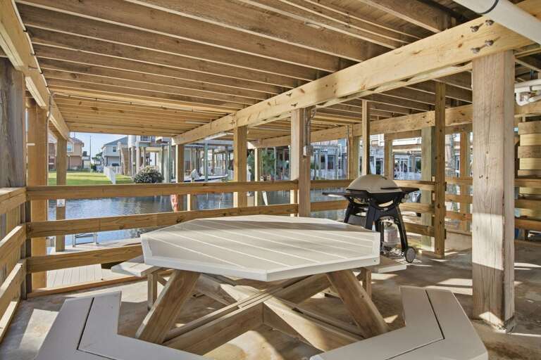 Enjoy casual outdoor meals at the picnic table while taking in the peaceful canal-side setting.