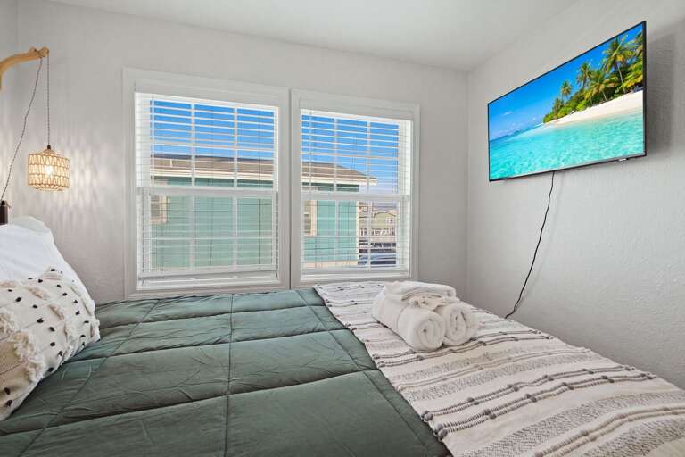 Unwind in this bright and comfortable bedroom after a full day of coastal adventures.