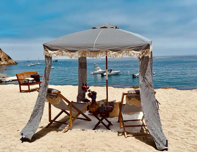 Enjoy the beach with a  cabana  Enjoy the beach with a  cabana