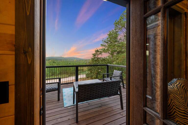 Upstairs balcony with seating for 6 and mountain views.