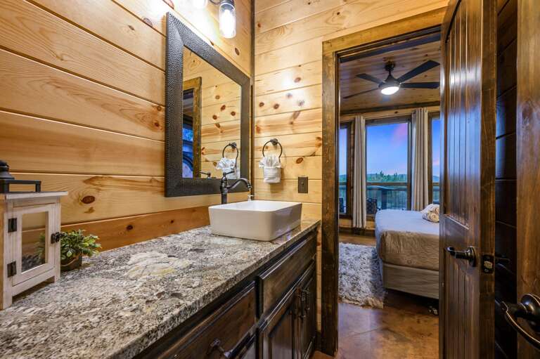 Downstairs full bathroom adjoined by both first floor bedrooms.