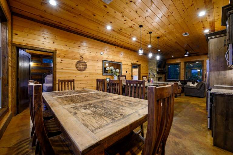 Dining room table with seating for 8, connected to the great room.