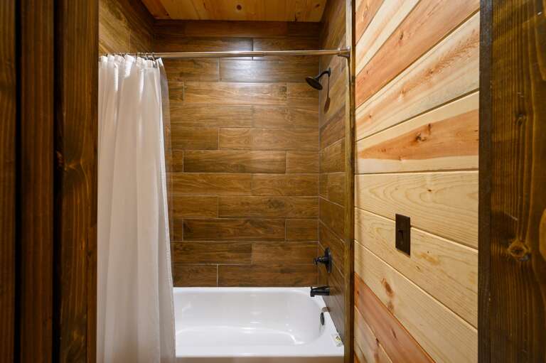 Upstairs bathroom shower / tub.