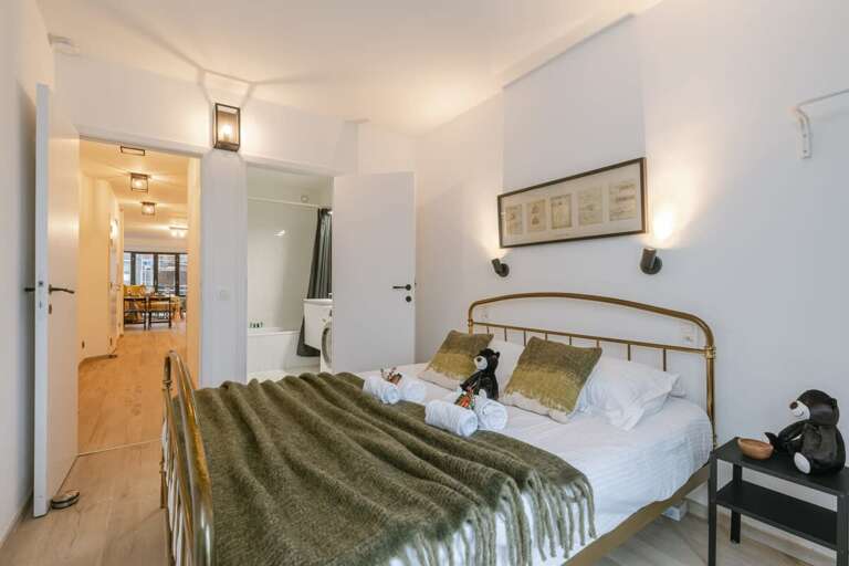 Bright Bedroom Leading To Luminous Living Space