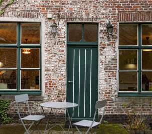Huswell - Retro apartment with cozy city garden