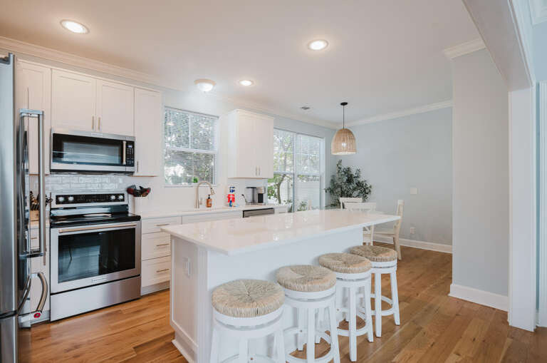 Sleek Kitchen, Stools, Stove, Sunlight Streaming