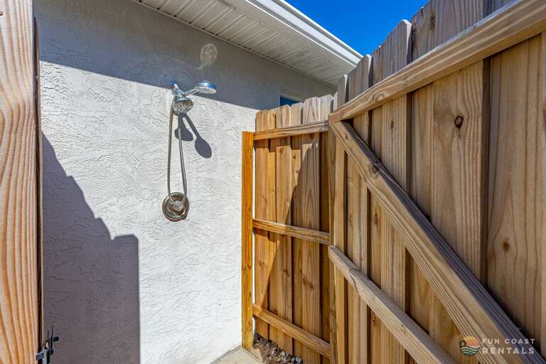 Outdoor shower to rinse off after a fun day at the beach!