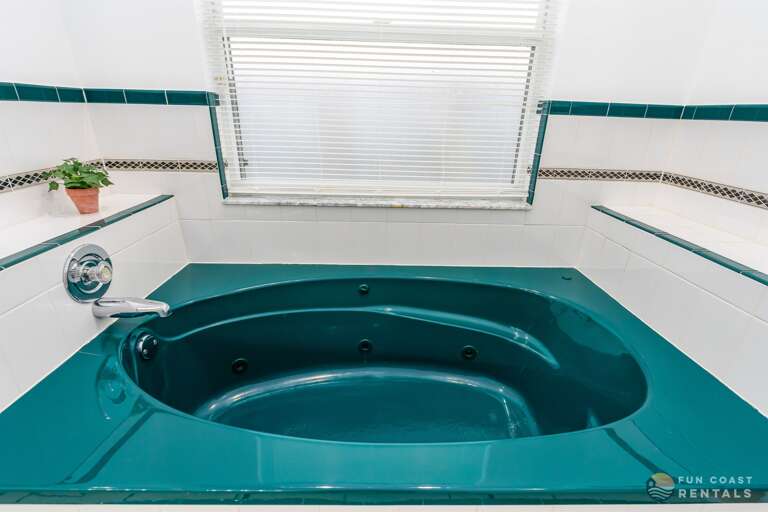 Master Jack and Jill Bathroom with Jetted Tub