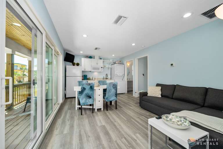 Living Room Area with Dining Table and Kitchenette