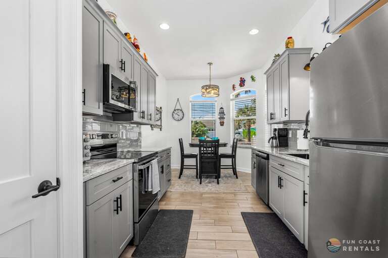 Upgraded and Fully Equipped Stainless Steel Kitchen with Dining Nook