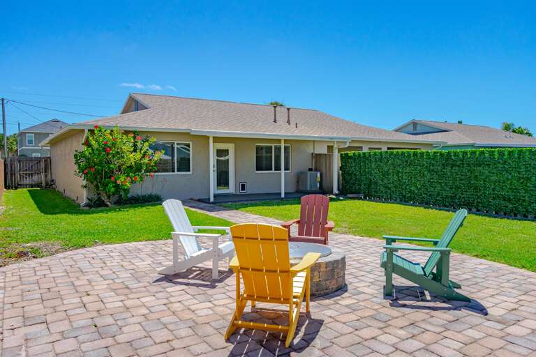 Endless Summer Fenced Backyard w/ Adirondack Chairs