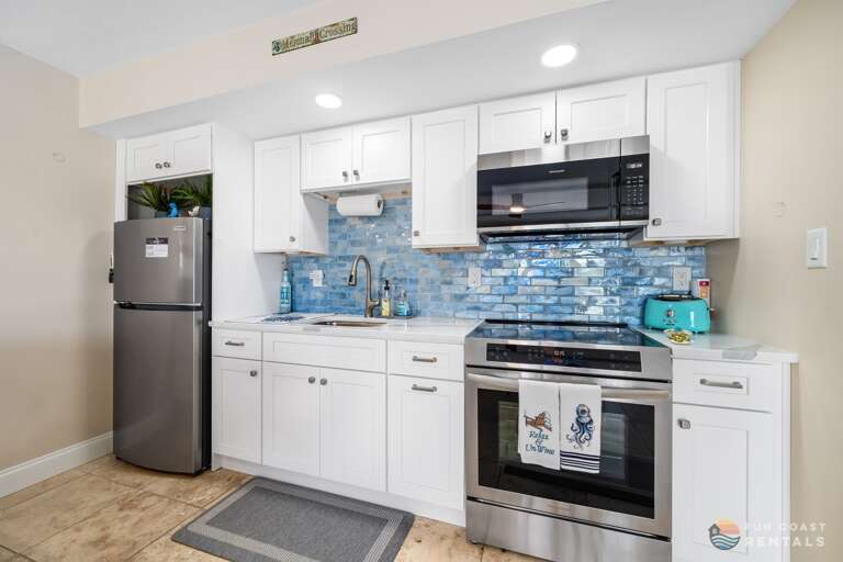 Modern Stainless Steel Kitchen with Island Dining