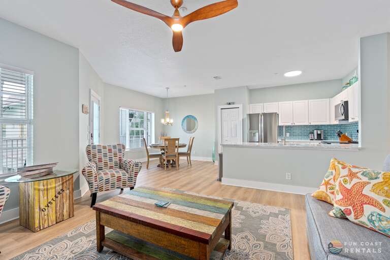 Inviting Living Room with Ample Seating, Kitchen &amp; Dining Area