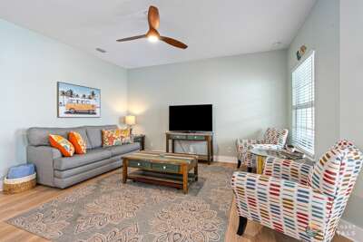 Inviting Living Room with Ample Seating and 55" Smart TV