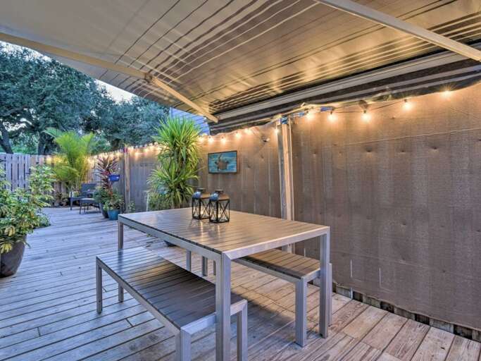 Fenced Side Yard with Awning and Dining Table