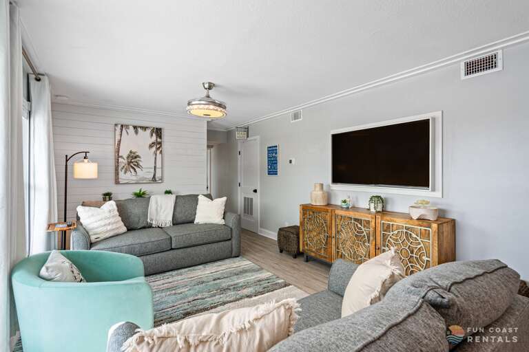 Spacious Living Room Area with Smart TV