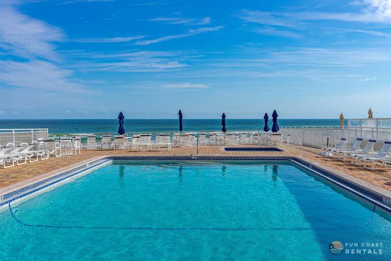 Lounge in the sunshine at the Beachfront Pool!