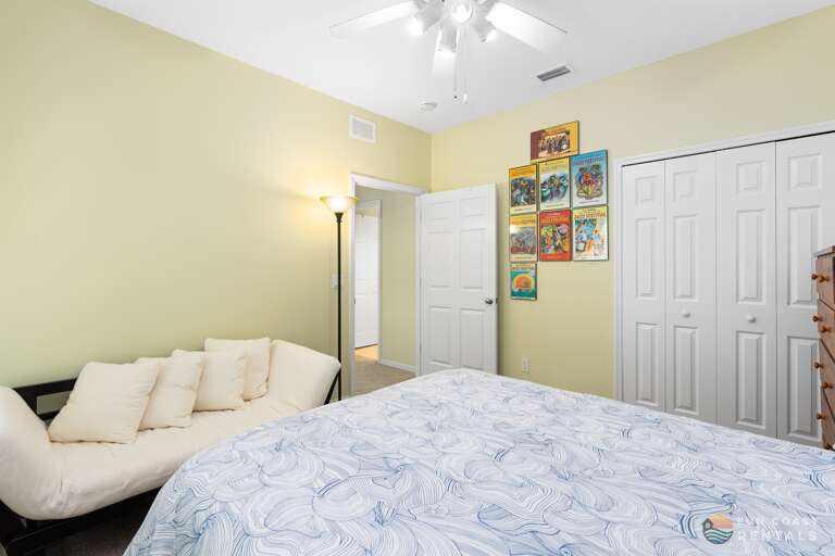 Queen bedroom with walk-in closet.