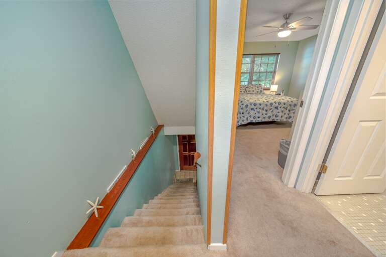 Staircase and Queen Bedroom