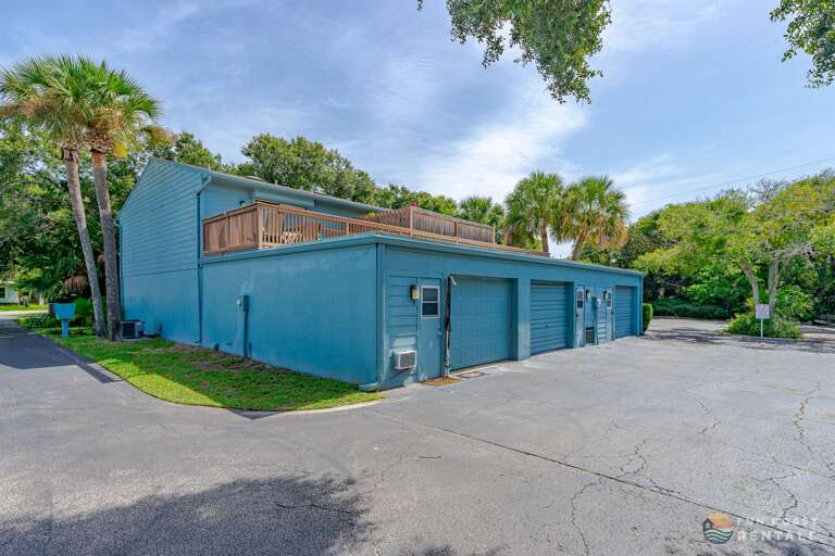 Rear Entrance and Enclosed Garage