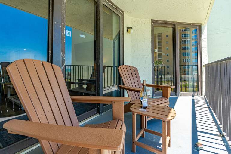 Spacious Covered Balcony with Ocean Views and Adirondack Chairs!