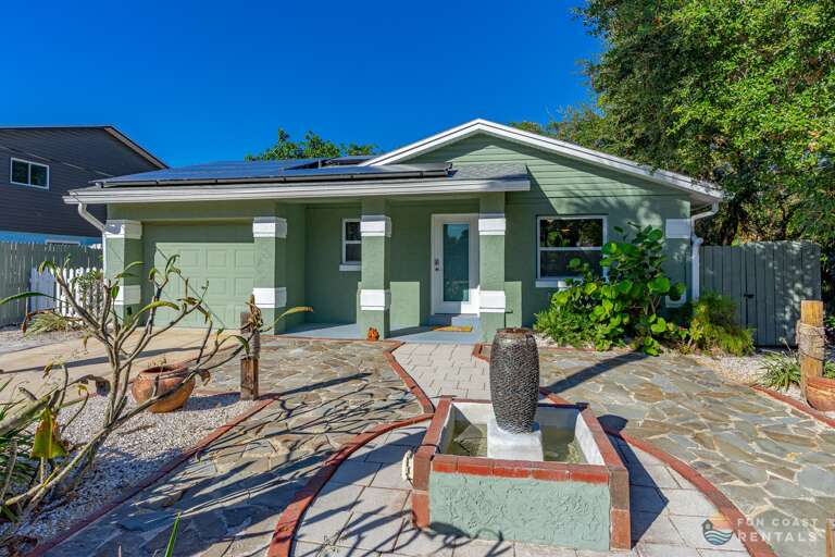 Front Entrance (Enclosed garage is for storage only.)