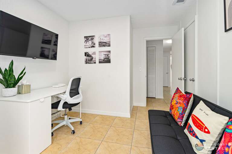 Work remote in the home office with plenty of natural light! Twin-sized sleeper futon, too!