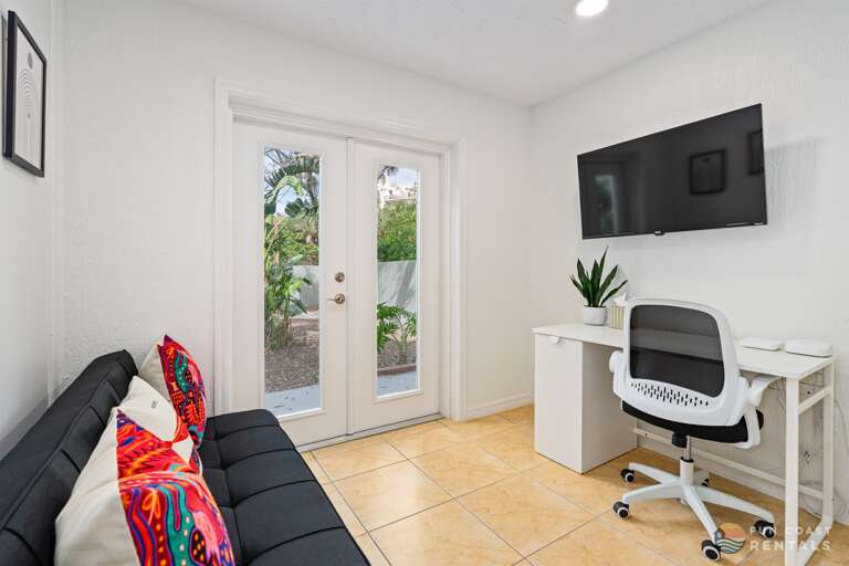 Work remote in the home office with plenty of natural light! Twin-sized sleeper futon, too!