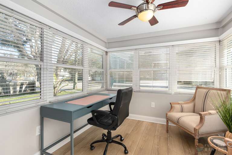 Home Office with ergonomic chair and natural light!