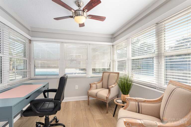 Home Office with ergonomic chair and natural light!