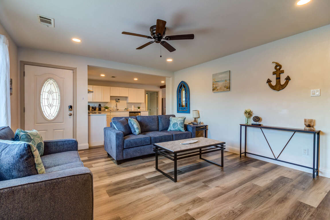 Living room w/ views of kitchen  Living room w/ views of kitchen