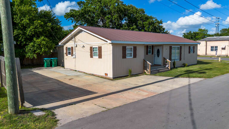Side view of home - ample parking 
