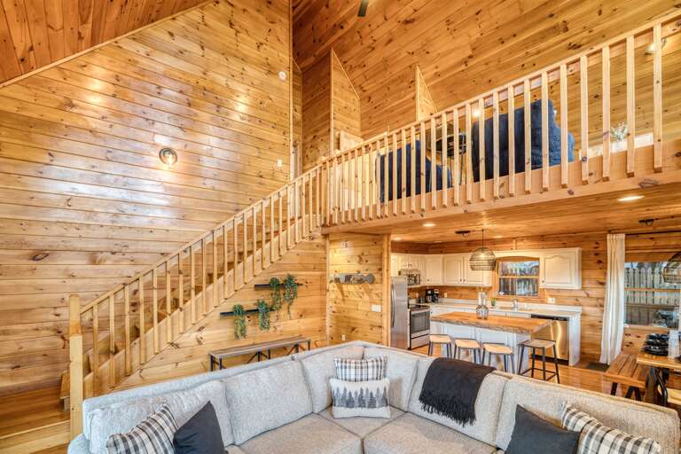 Living room w/ views of loft