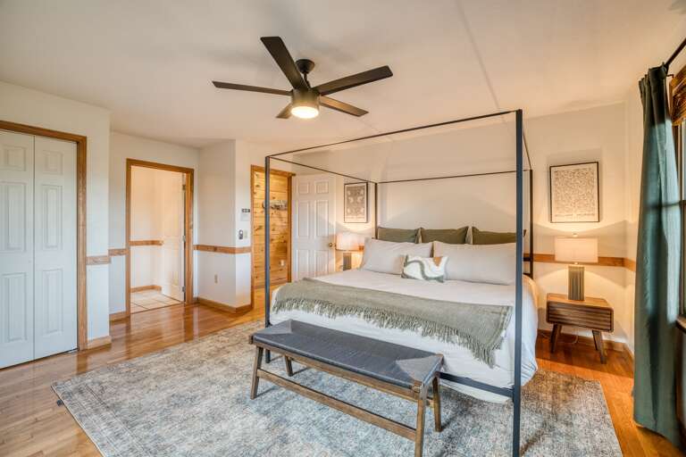 Master bedroom w/ views of en-suite bathroom