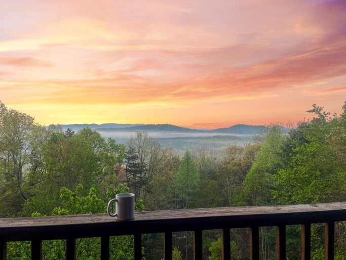 Beautiful sun rise w/ fog view from the deck