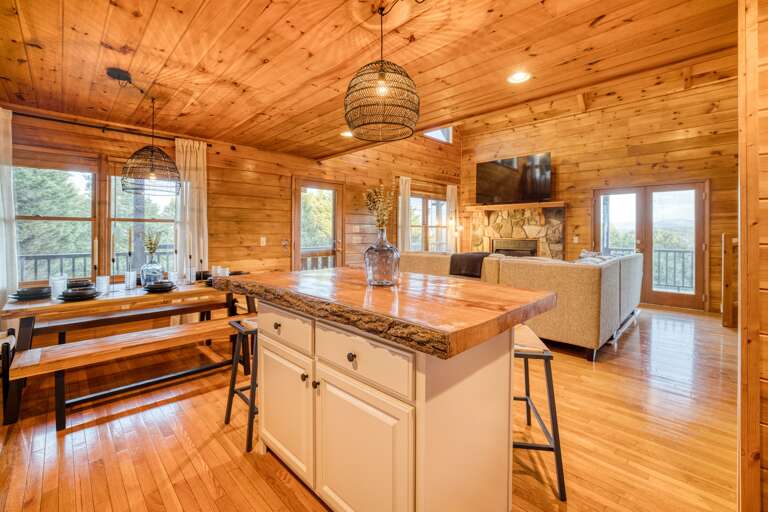 kitchen w/ views of dining area and living room