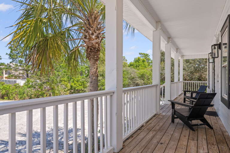 Imagine the cool sea breeze on your face as you sip on a cup of coffee on your private rocking chair front porch