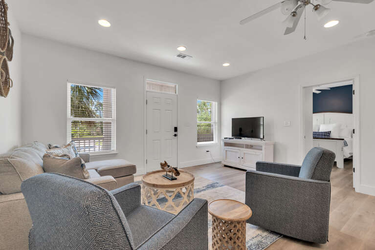 Living Room with 65 inch SMART TV with all the apps for you to login and watch your favorite game, movie, or show!