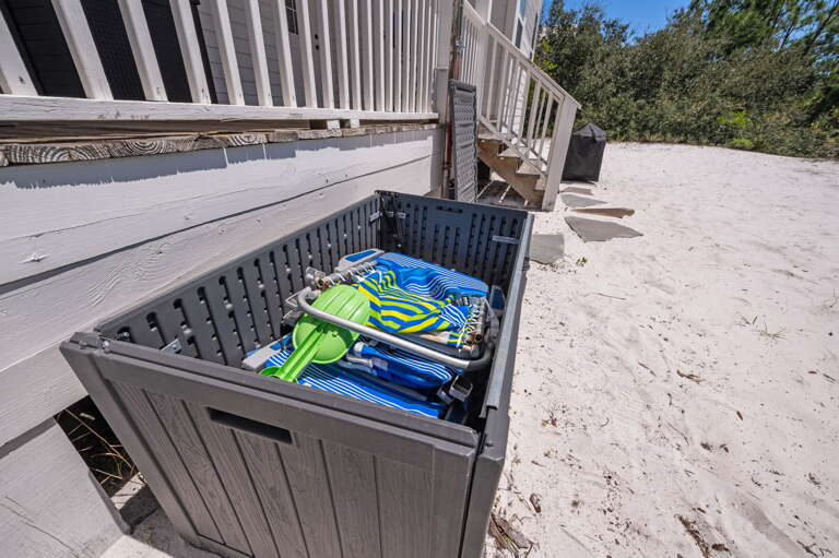 Folding chair and beach toys for kids.