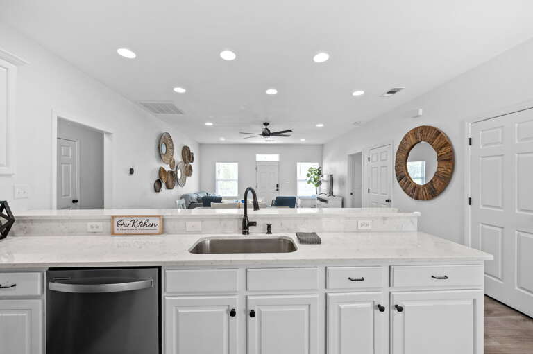 This stunning kitchen is a chef's dream come true. The space is designed with functionality and style in mind, featuring top-of-the-line stainless steel appliances, sleek cabinetry, and beautiful countertops.