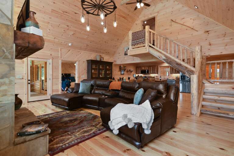 Living room w/ leather couches