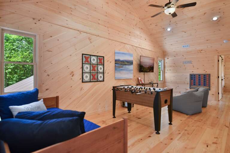 Game room/loft area with large tic/tac toe games