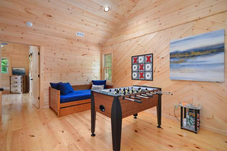 Foosball table- day bed with twin trundle underneath