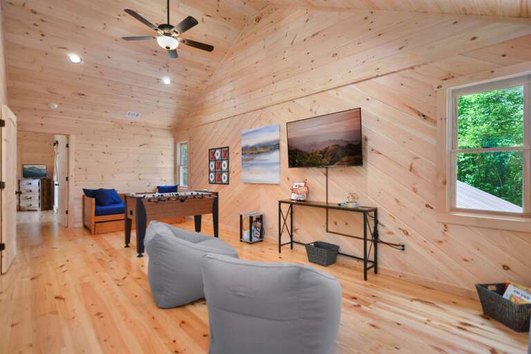 Game room/loft with 55" Smart TV, foosball table