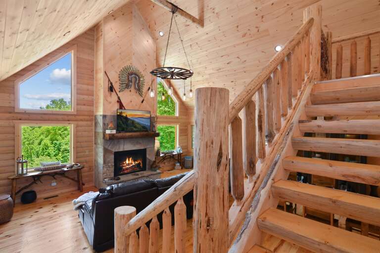 Staircase going upstairs to two bedrooms and game room