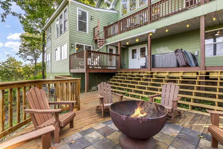 Fire pit area with multiple decks Fire pit area with multiple decks