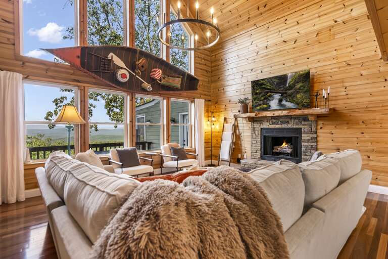 Warm and inviting living room with wood burning fireplace Warm and inviting living room with wood burning fireplace