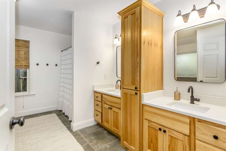 Double vanities and shower 