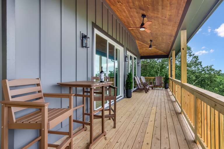 Wrap around porch with ample seating 