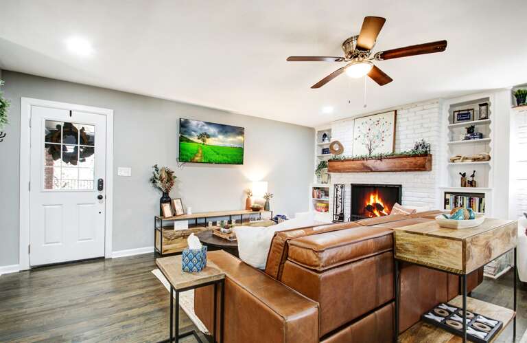 Cozy Couch and Large Smart TV in Living Room One